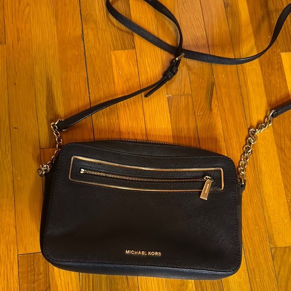 Michael Kors Handbags - Michael Kors Black and Gold Crossbody Bag with Leather Finish